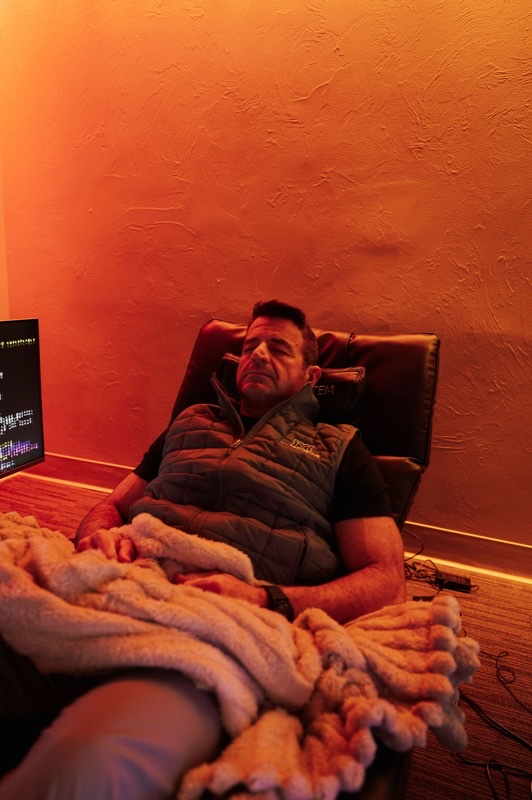 MitoSolis Vitamin D lamp casting warm orange light during a session